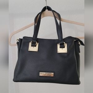 Black purse with crossbody strap